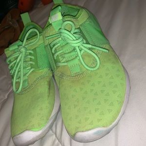 green Nike shoes